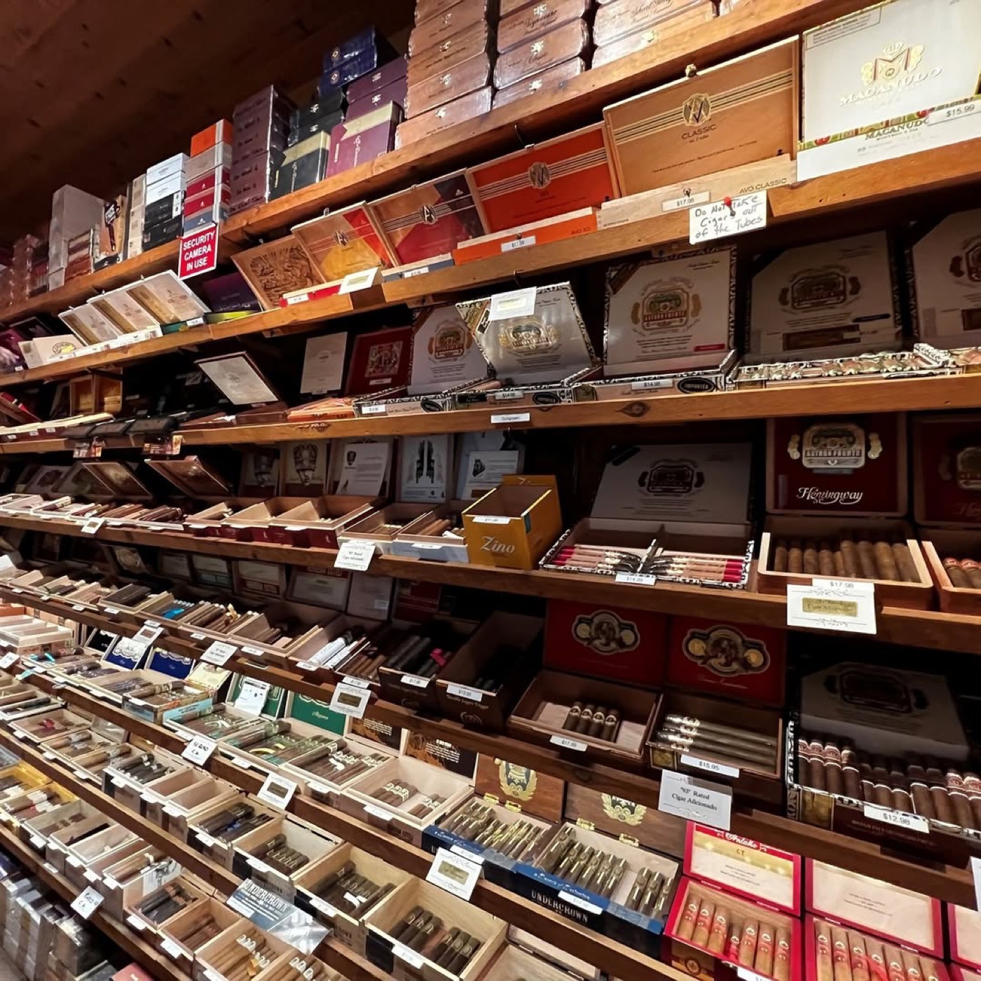 Wall of premium cigars in the Cigar Grotto humidor